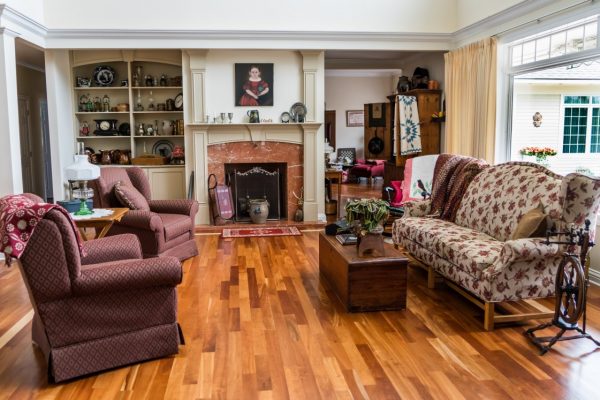 What makes this eclectic style living room very functional and eye-catching ?